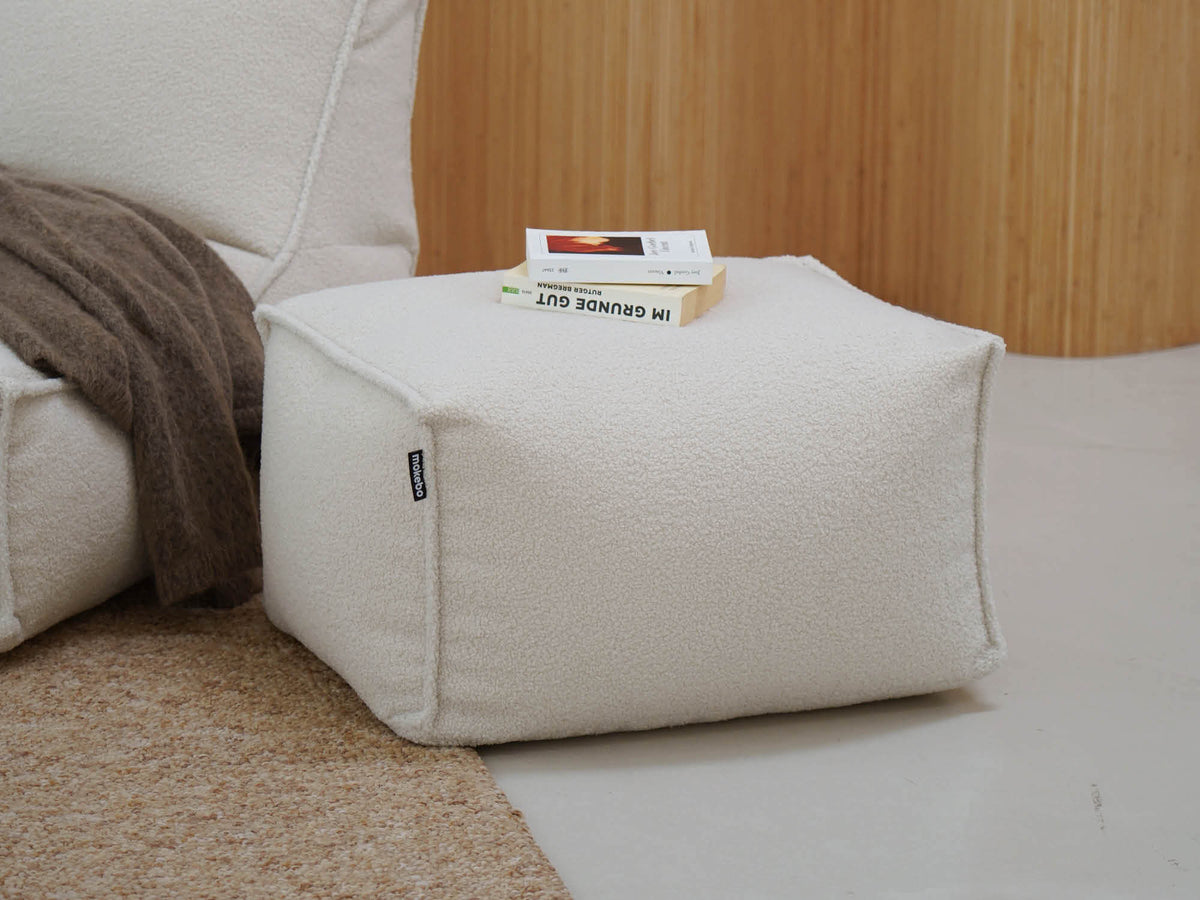 Bouclé Pouf Hocker in beige 